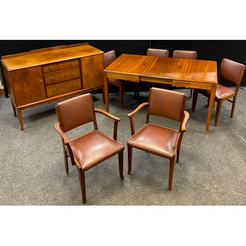 254 - A mid-20th century walnut dining room suite, by Waring & Gillow, comprising extending dining table w... 