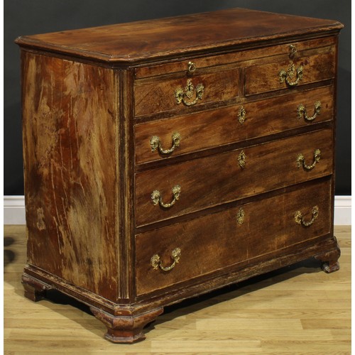 2228 - A George III mahogany bachelors chest, of canted rectangular form, oversailing top above a brushing ... 