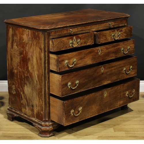 2228 - A George III mahogany bachelors chest, of canted rectangular form, oversailing top above a brushing ... 