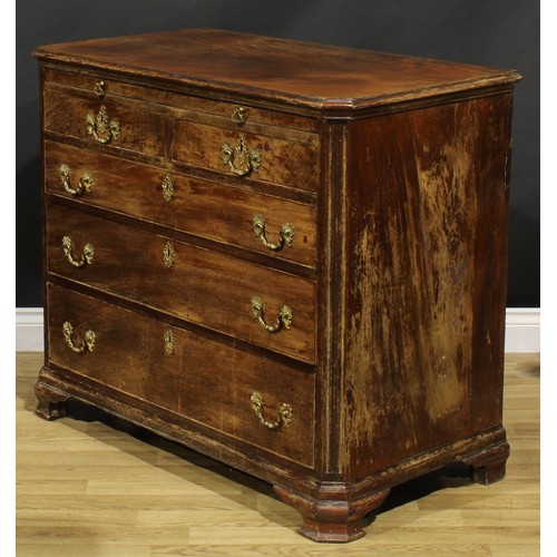 2228 - A George III mahogany bachelors chest, of canted rectangular form, oversailing top above a brushing ... 