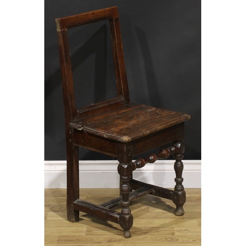 1227 - A harlequin pair of 18th century oak backstools, boarded seats, H-stretchers, the largest 85.5cm hig... 