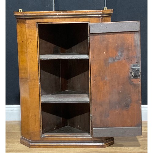 309 - An 18th century walnut wall hanging corner cupboard