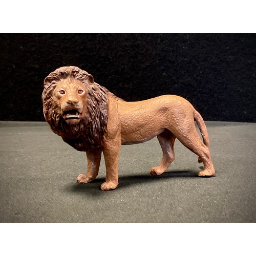 342 - After Bergmann, a cold painted metal model, Standing Lion, 9.5cm long.