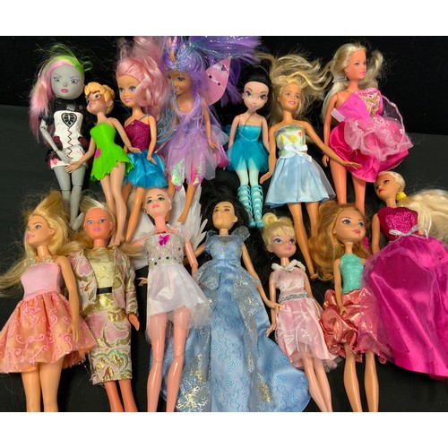 344 - Toys - a collection of Barbie dolls, various dresses and outfits