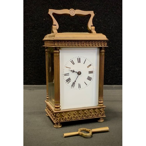 350 - An early 20th century carriage clock, ornate banded case, white dial, bold Roman numerals, 16cm high