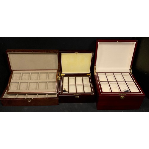 59 - A mahogany dome topped watch box, hinged lid enclosing fitted interior for twenty watches in two lev... 