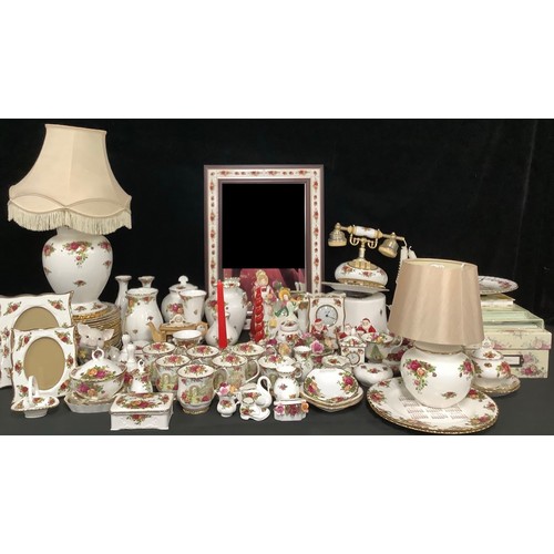 5130 - A Royal Albert Old Country Roses pattern telephone, two lamps, two picture frames, selection of pict... 