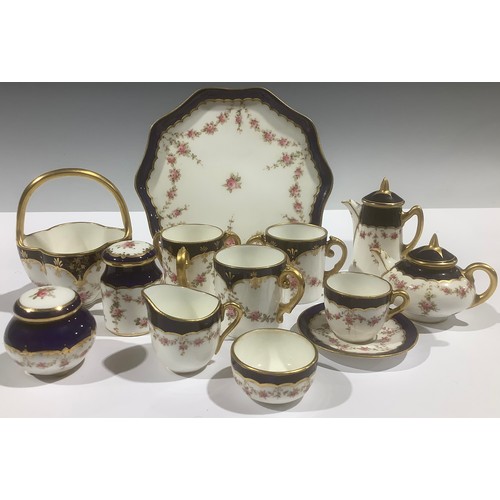 5063 - A Coalport miniature part tea service, comprising teapot, coffee pot, cream jug, sugar bowl, cup and... 