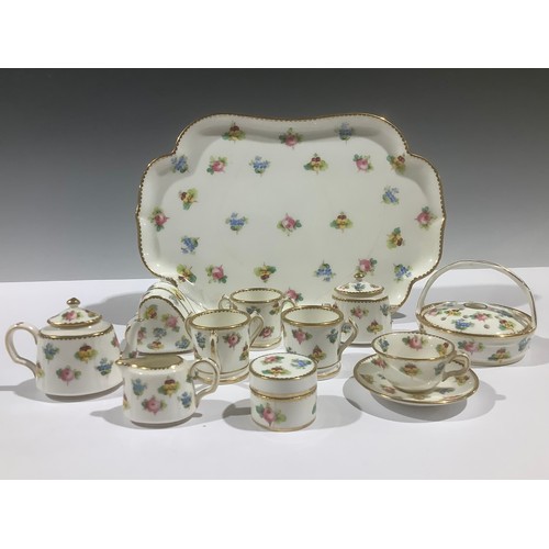 5070 - A Mintons miniature tea service, painted with scattered flowers, gilt edged rims, comprising teapot,... 