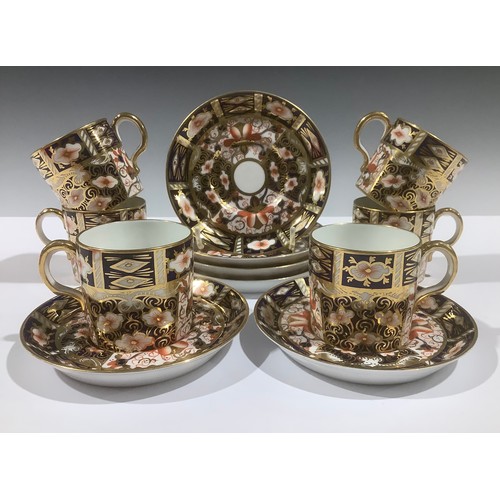 5074 - A set of six Royal Crown Derby 2451 Imari pattern coffee cans and saucers, early 20th century