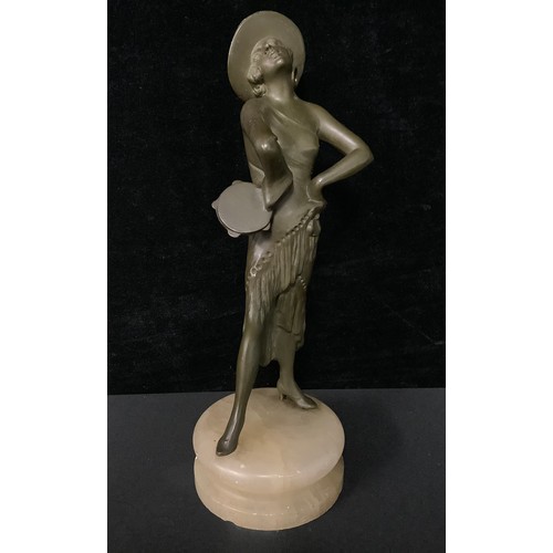 5081 - An Art Deco figure, of a Spanish dancer holding a tambourine, 27cm