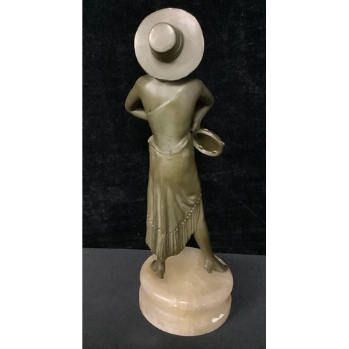 5081 - An Art Deco figure, of a Spanish dancer holding a tambourine, 27cm