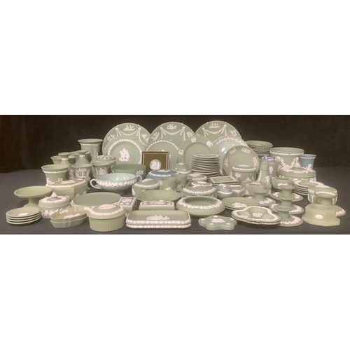 5160 - A large collection of Wedgwood Jasperware, sage green, including powder bowl and cover, boudoir cand... 