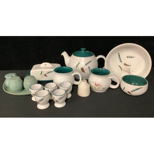 5175 - A Denby Greenwheat pattern teapot, butter dish, serving bowl, five eggcups, sugar bowl, two similar ... 