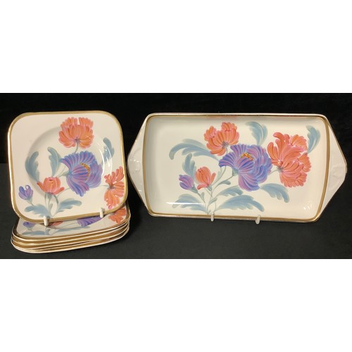 5097 - A Gray's pottery sandwich set, painted with stylised flowers, in the manner of Susie Cooper