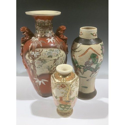 5105 - A Japanese export ware Satsuma style vase, pair of lion dog handles, 31cm; two other export ware vas... 