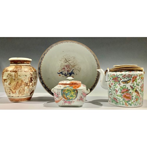 5112 - A Chinese famille rose tea or wine kettle, decorated in polychrome enamels, with fanciful birds and ... 