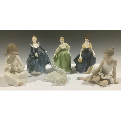 5114 - A Royal Doulton figure, Melanie, HN2271; others, Fragrance, HN2334: Fair Lady, HN2193; a Nao, by Lla... 