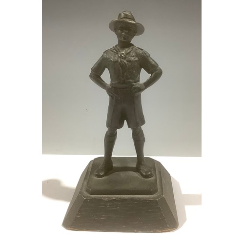 5116 - A patinated bronze figure, of a Boy Scout, oak base, 13cm high