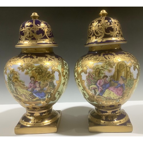 5118 - A pair of continental style pedestal baluster vases and covers, printed with courting couples in 18t... 