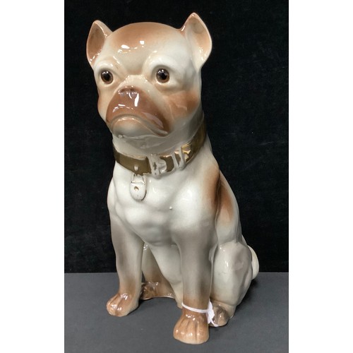 5128 - A large Victorian Staffordshire seated pug dog, 34cm