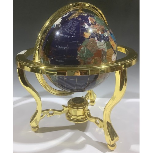 5129 - A brass mounted specimen stone desk globe on stand, 37cm, late 20th century