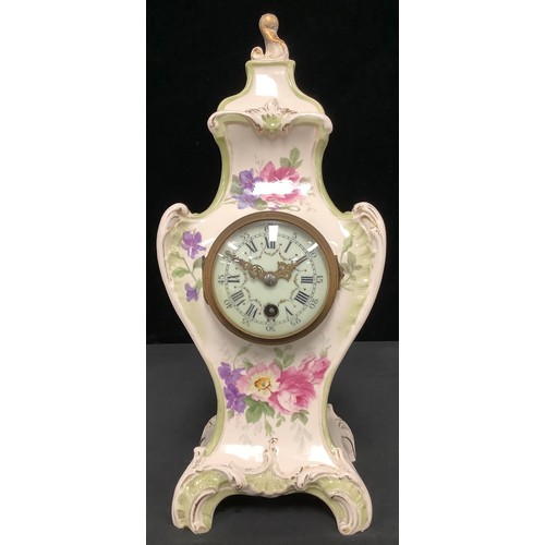 5267 - Clocks - A 19th century Royal Bonn floral porcelain cased mantle clock, the finial a gilded acanthus... 