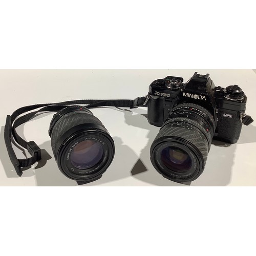 5299 - Cameras - a Minolta X-700 35mm camera, with Japanese Sigma UC zoom lens, 28 - 70mm, 2XMX Teleplus MC... 