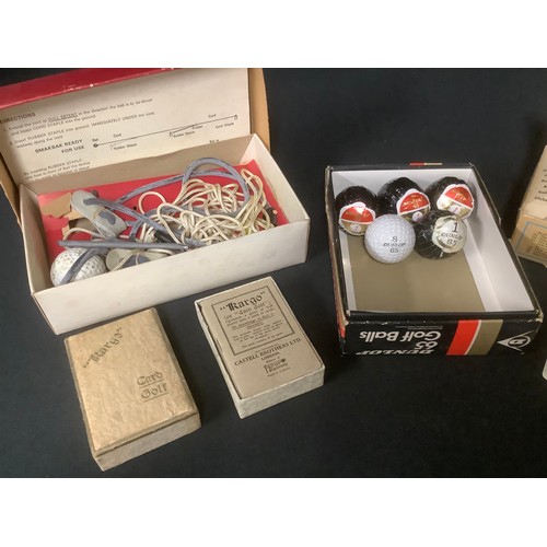 5380 - Golf - a set of four Dunlop 65 golf balls, wrapped, another, in original box; two sets of Kargo Card... 