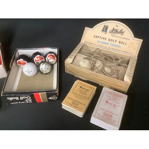 5380 - Golf - a set of four Dunlop 65 golf balls, wrapped, another, in original box; two sets of Kargo Card... 