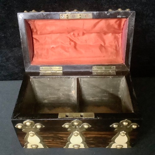 5388 - A 19th century Gothic Revival brass and ivorine mounted coromandel tea caddy, the domed hinged cover... 