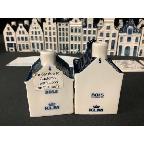 5393 - Ceramics- A KLM Delft Blue miniature house Bol gin decanter, 11cm high; others similar, qty