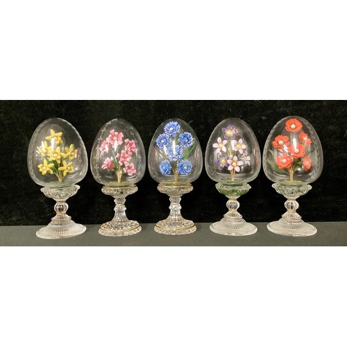 5394 - A set of five Franklin Mint House of Faberge clear glass pedestal eggs, each with an enamel floral s... 