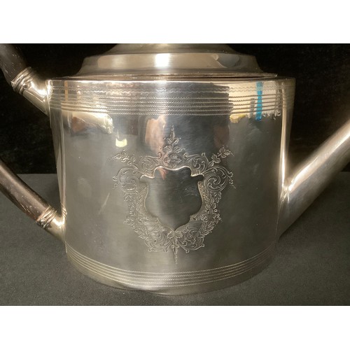 5020 - A George III silver oval teapot, angular spout, ebonised scroll handle and knop, pair of vacant shie... 