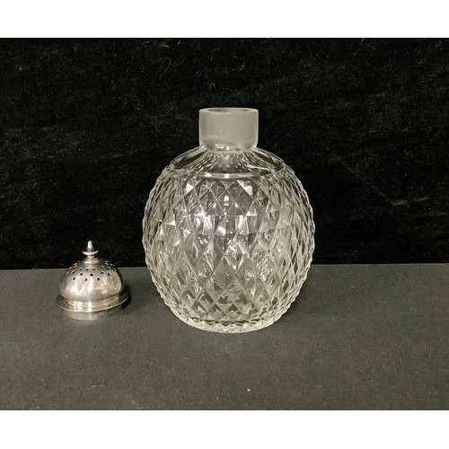 5021 - A Victorian silver mounted globular clear glass sugar caster, the domed pierced cover with finial, 1... 