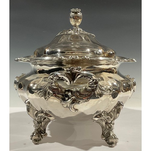 526 - A William IV Old Sheffield plate fluted oval soup tureen and cover, in the Rococo Revival taste, bud... 