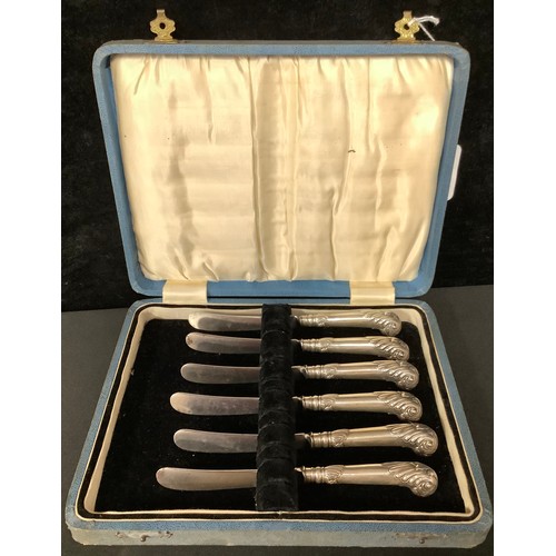 5036 - A cased set of six Art Nouveau silver pistol handled knives; an Art Nouveau silver handled button ho... 