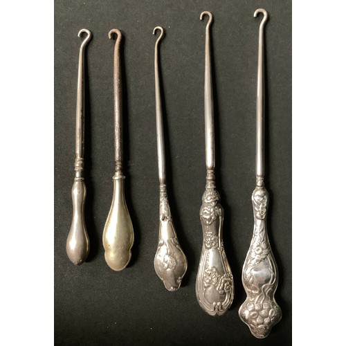 5036 - A cased set of six Art Nouveau silver pistol handled knives; an Art Nouveau silver handled button ho... 