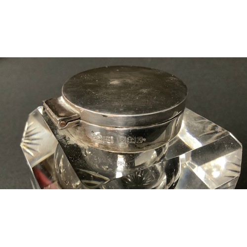 5037 - An inkwell with hallmarked silver top