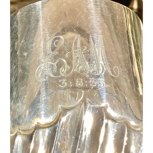 5039 - An Edwardian silver cup, wrythen grasped, slightly spreading cylindrical foot, 8cm high, London 1904... 