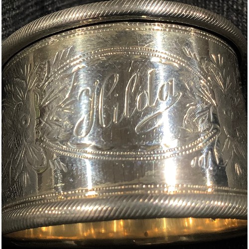 5319 - A Victorian silver napkin ring, Birmingham 1899; other silver napkin rings; 161g (7)