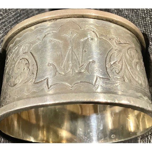 5319 - A Victorian silver napkin ring, Birmingham 1899; other silver napkin rings; 161g (7)