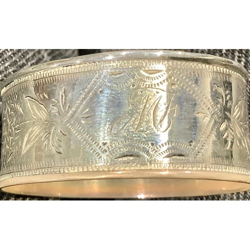 5319 - A Victorian silver napkin ring, Birmingham 1899; other silver napkin rings; 161g (7)