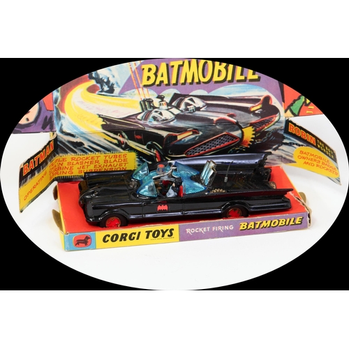 7126 - Corgi Toys 267 Rocket Firing Batmobile, black body with black and red Bat decals to side doors, seat... 