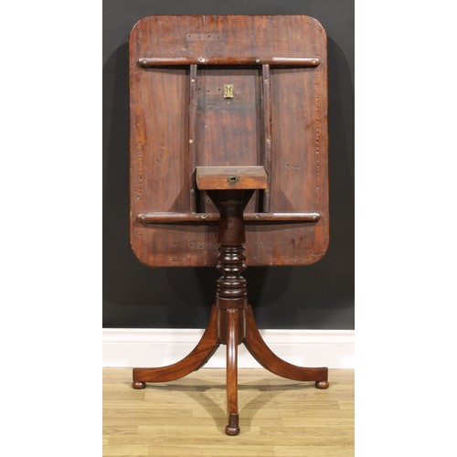 5363A - A 19th century mahogany tripod occasional table, rounded rectangular tilting top, turned column, out... 