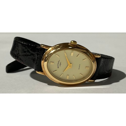 5560 - A lady's Rotary 9ct gold watch, oval dial, baton indicators, marked 375, black leather strap, boxed