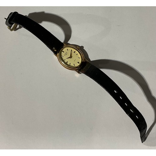 5560 - A lady's Rotary 9ct gold watch, oval dial, baton indicators, marked 375, black leather strap, boxed