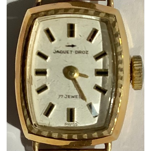 5564 - A lady's Jaquet Droz 9ct gold watch, rounded rectangular dial, baton indicators, integral 9ct gold f... 