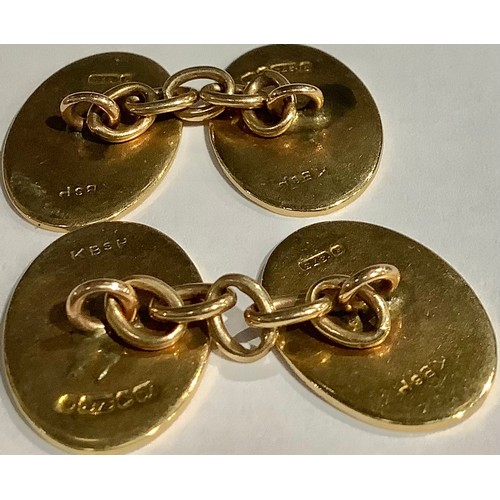 5568 - A pair of 9ct gold oval cuff links, engine turned, marked 375, 6.5g; two other pairs of 9ct rose gol... 