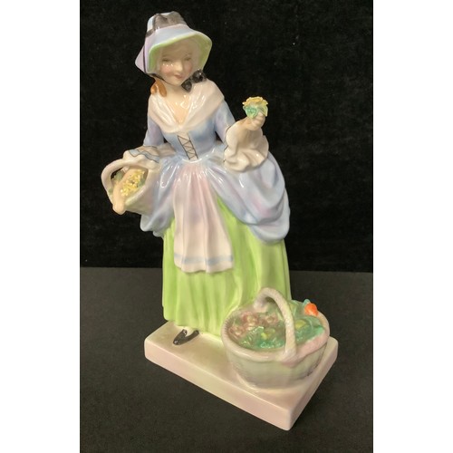 5569 - A Royal Doulton figure, Spring Flowers, HN1807, 18cm high